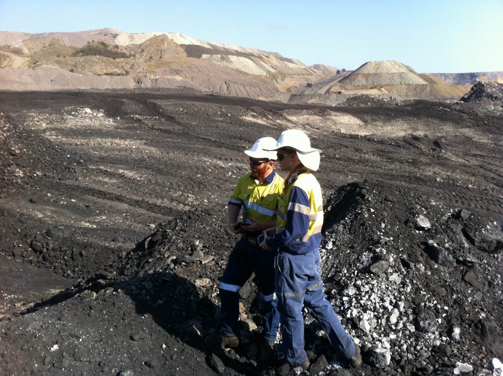 Mine Geologists Working With Coal Clean Up Crew