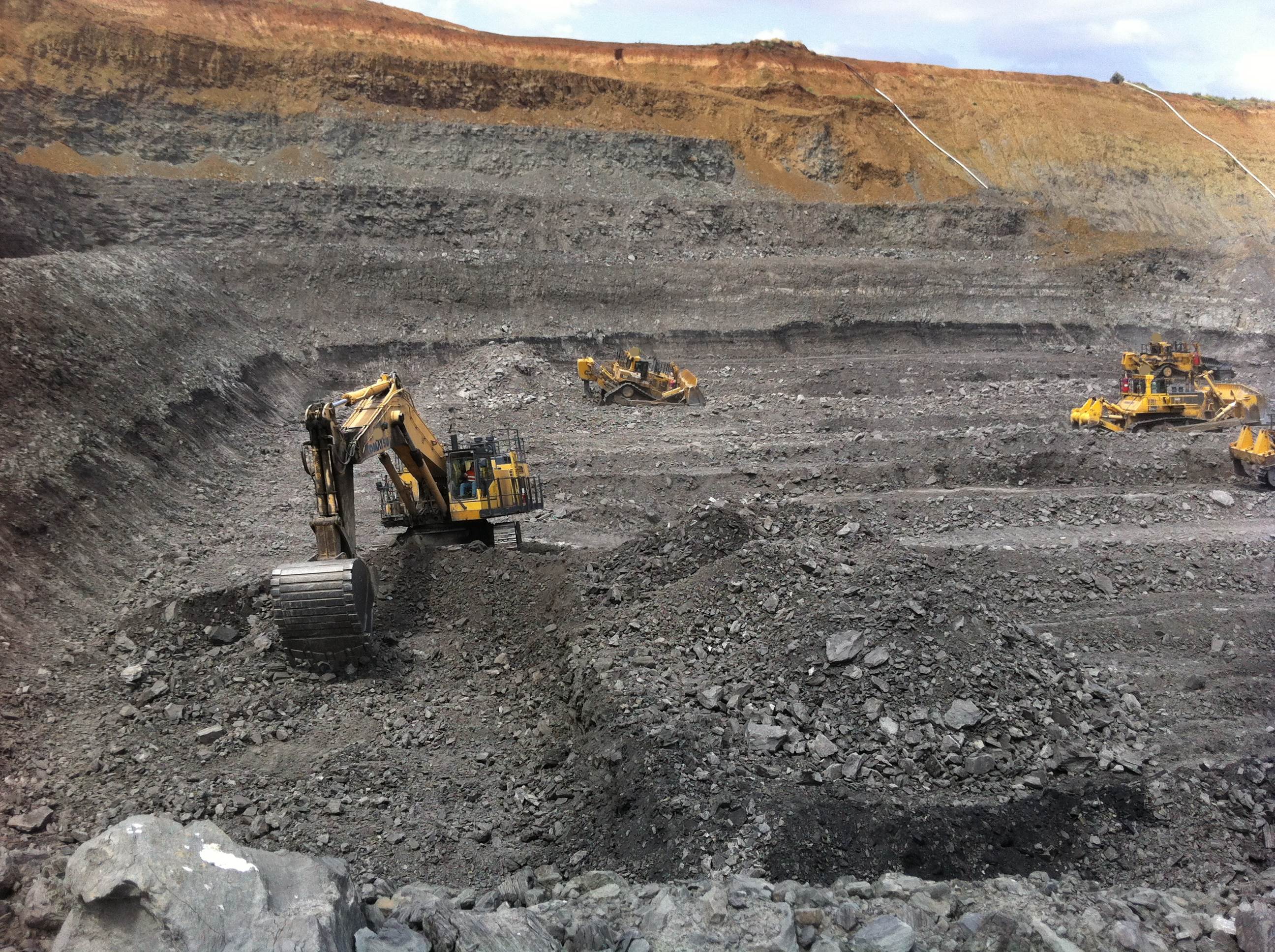 Small Excavator and Dozer Push to Uncover Coal Seam